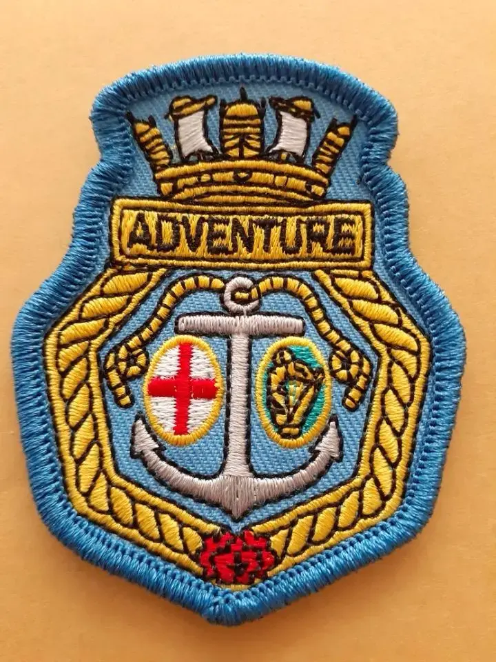 Detailed multicolour embroidered crest patch