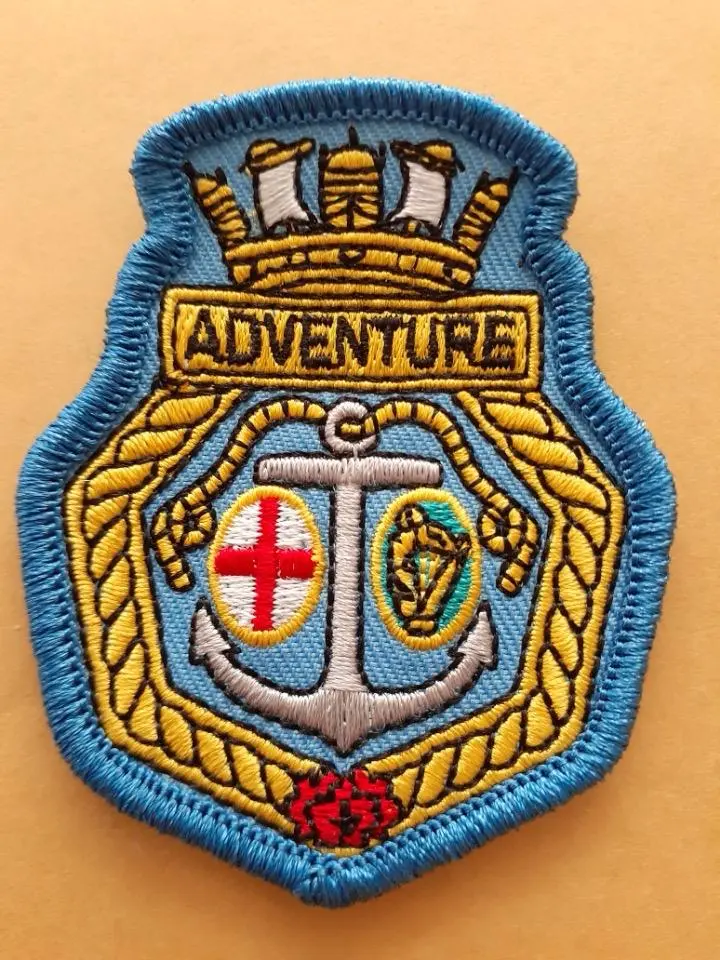 Detailed multicolour embroidered crest patch